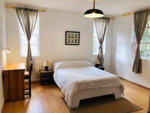 Letto o letti in una camera di Hostal Alcala