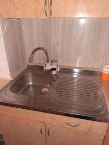 Kuchyň nebo kuchyňský kout v ubytování KRIN apartman