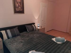 Letto o letti in una camera di KRIN apartman