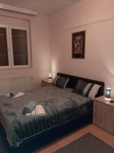 Postel nebo postele na pokoji v ubytování KRIN apartman + 6 fotografií