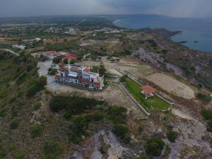 an aerial view of a house on a mountain at Panorama Studios in Kefalos