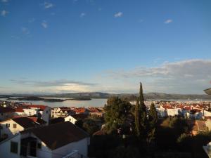 a view of a city and a body of water at Apartments Villa Arta in Murter