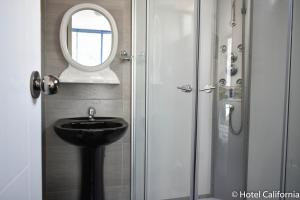 Koupelna v ubytování Hotel California Calca