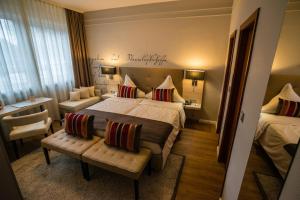 Postel nebo postele na pokoji v ubytování Hotel Zum Zeppelin Hamburg