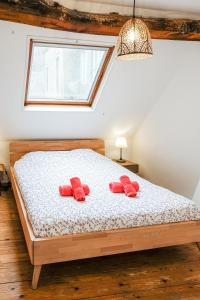 Säng eller sängar i ett rum på Les Cerisiers - Duplex de Standing au Centre de Namur