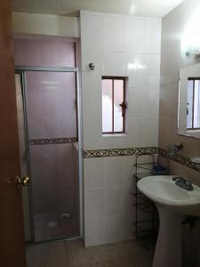 Vonios kambarys apgyvendinimo įstaigoje Casa Poceros