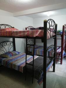 Dviaukštė lova arba lovos apgyvendinimo įstaigoje Casa Poceros
