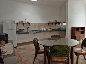 Kuchyň nebo kuchyňský kout v ubytování Casa Del Aire
