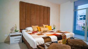 Postel nebo postele na pokoji v ubytování Hotel Boutique Casa Umiña