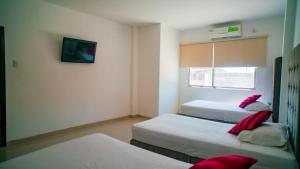Postel nebo postele na pokoji v ubytování Hotel Boutique Casa Umiña