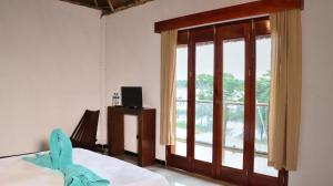 Voodi või voodid majutusasutuse Hotel Itza Coba toas