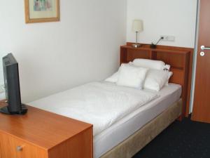 Postel nebo postele na pokoji v ubytování Haus Köbesine