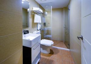 Koupelna v ubytování Talmud Hotel Tainan
