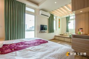 Postelja oz. postelje v sobi nastanitve Tong Xin Farmstay