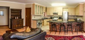 Kuchyň nebo kuchyňský kout v ubytování Antiqua Cottage