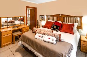 Postel nebo postele na pokoji v ubytování Antiqua Cottage