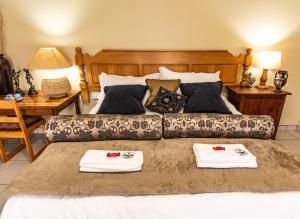 Postel nebo postele na pokoji v ubytování Antiqua Cottage + 4 fotografie