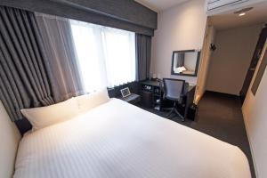 TV a/nebo společenská místnost v ubytování FP HOTELS South-Namba