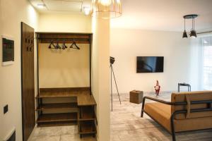 TV a/nebo společenská místnost v ubytování Elite Loft Apart