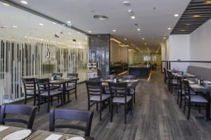 Restoran atau tempat lain untuk makan di TIME Onyx Hotel Apartments