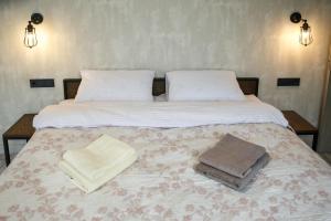 Postel nebo postele na pokoji v ubytování Elite Loft Apart