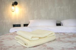 Postel nebo postele na pokoji v ubytování Elite Loft Apart