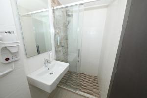 Koupelna v ubytování Hotel Delfin
