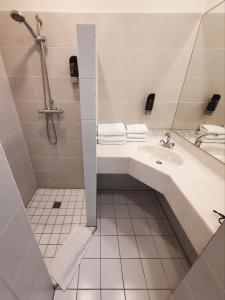 Koupelna v ubytování Hotel Washington