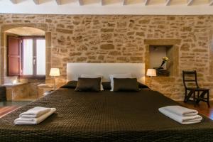 Postel nebo postele na pokoji v ubytování Casa Murallas para 6 con piscina en Alcudia cerca de playas + 37 fotografií