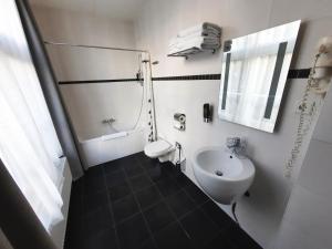Koupelna v ubytování Hotel Washington