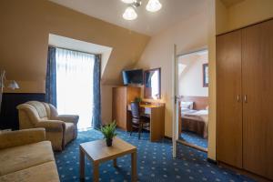 TV a/nebo společenská místnost v ubytování Hotel Luna Budapest