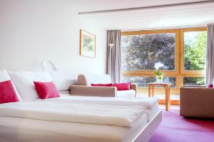 Voodi või voodid majutusasutuse Hotel Kreuz Lenk toas