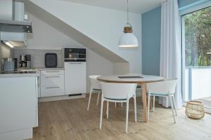 Küche/Küchenzeile in der Unterkunft Upstalsboom Residenzen Trassenheide