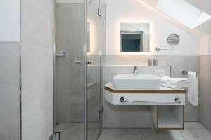 Ein Badezimmer in der Unterkunft Upstalsboom Residenzen Trassenheide