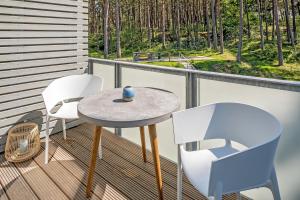 Ein Balkon oder eine Terrasse in der Unterkunft Upstalsboom Residenzen Trassenheide