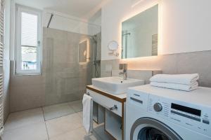 Ein Badezimmer in der Unterkunft Upstalsboom Residenzen Trassenheide