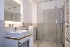 Ein Badezimmer in der Unterkunft Upstalsboom Residenzen Trassenheide