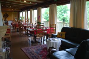 Posezení v ubytování Le Ranch des Lacs