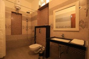 Vannituba majutusasutuses Rangmahal Pushkar by DIV HOSPITALITY