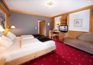 Postel nebo postele na pokoji v ubytování Hotel Bruno