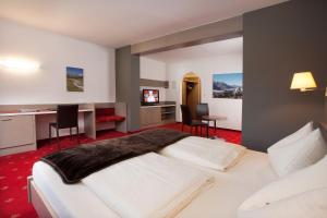 Postel nebo postele na pokoji v ubytování Hotel Bruno