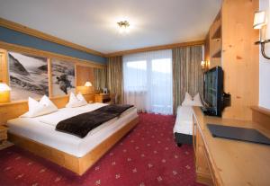 TV a/nebo společenská místnost v ubytování Hotel Bruno