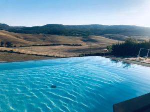 Bazén v ubytování Borgo del Silenzio - Apartments with pool in Lajatico nebo v jeho okolí