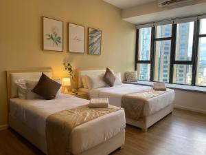 Postel nebo postele na pokoji v ubytování Ceylonz Starlight Suites Bukit Bintang + 37 fotografií