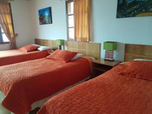 Cama o camas de una habitación en Hotel PrincesaToa