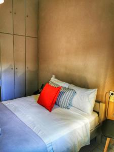Postel nebo postele na pokoji v ubytování Home Volos