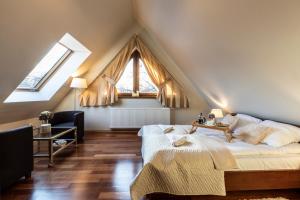Posteľ alebo postele v izbe v ubytovaní TatryTOP Apartamenty Kaszelewski