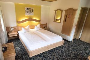 Postel nebo postele na pokoji v ubytování Hotel Löwen