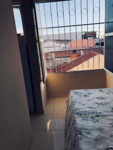 Postel nebo postele na pokoji v ubytování Kit Apartamento Central