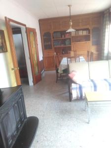 Uma área de estar em 4 bedrooms house with furnished terrace and wifi at Gironella